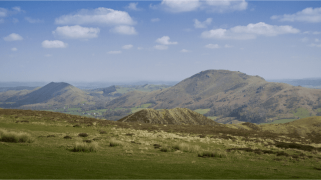 Shropshire Hills singles walking holidays, View from Long mynd, Caer Caradoc in the distance