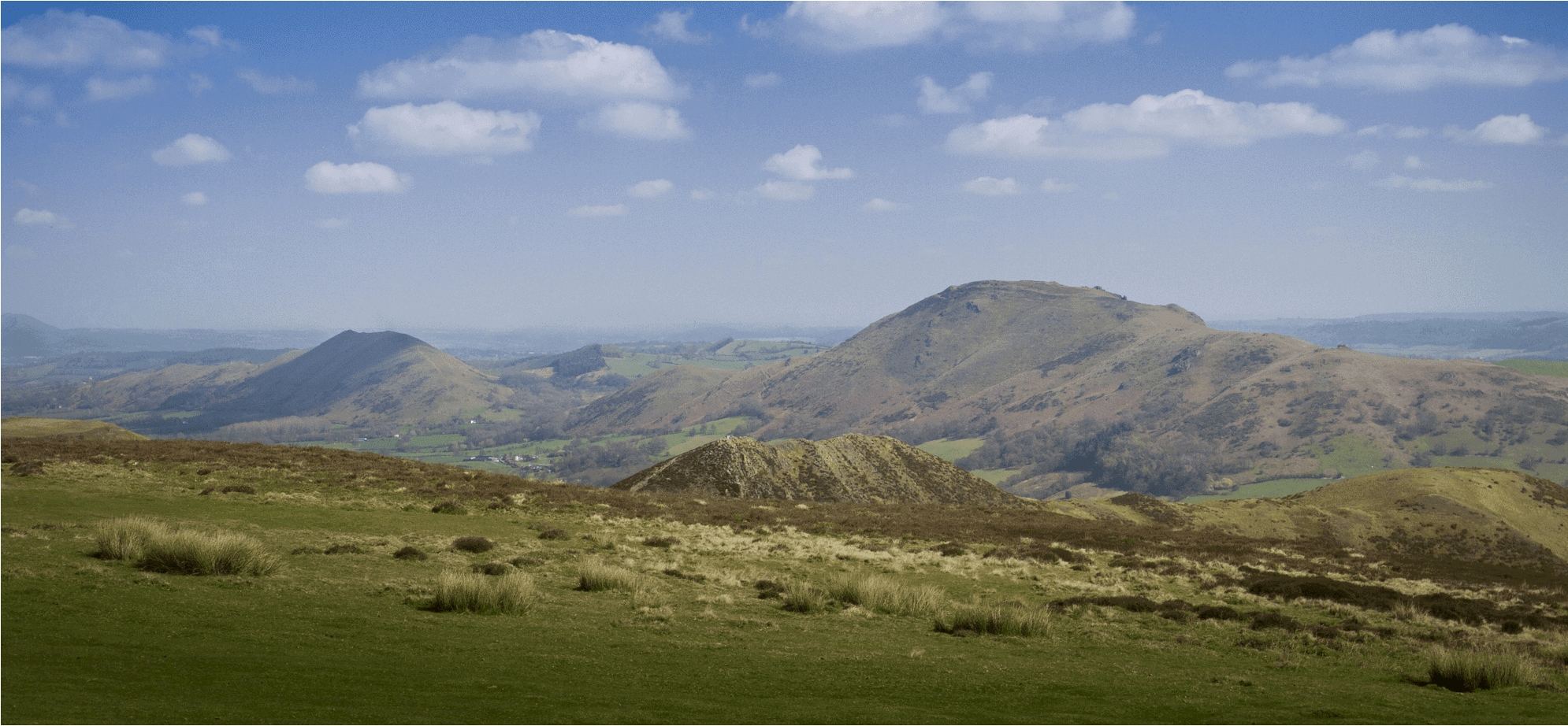 Shropshire Hills singles walking holidays, View from Long mynd, Caer Caradoc in the distance