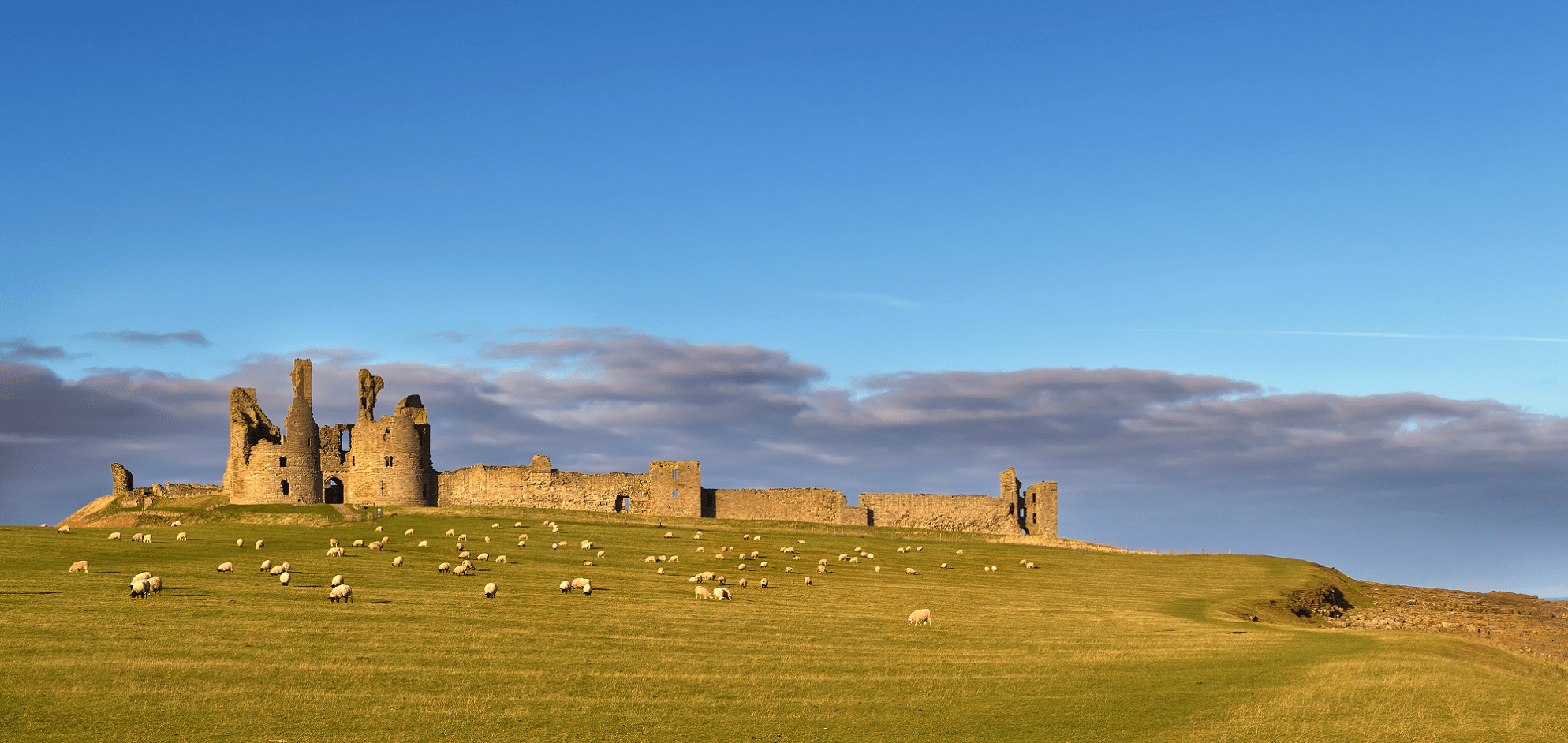 Dunstanburgh Castle between the villages of Craster and Embleton
