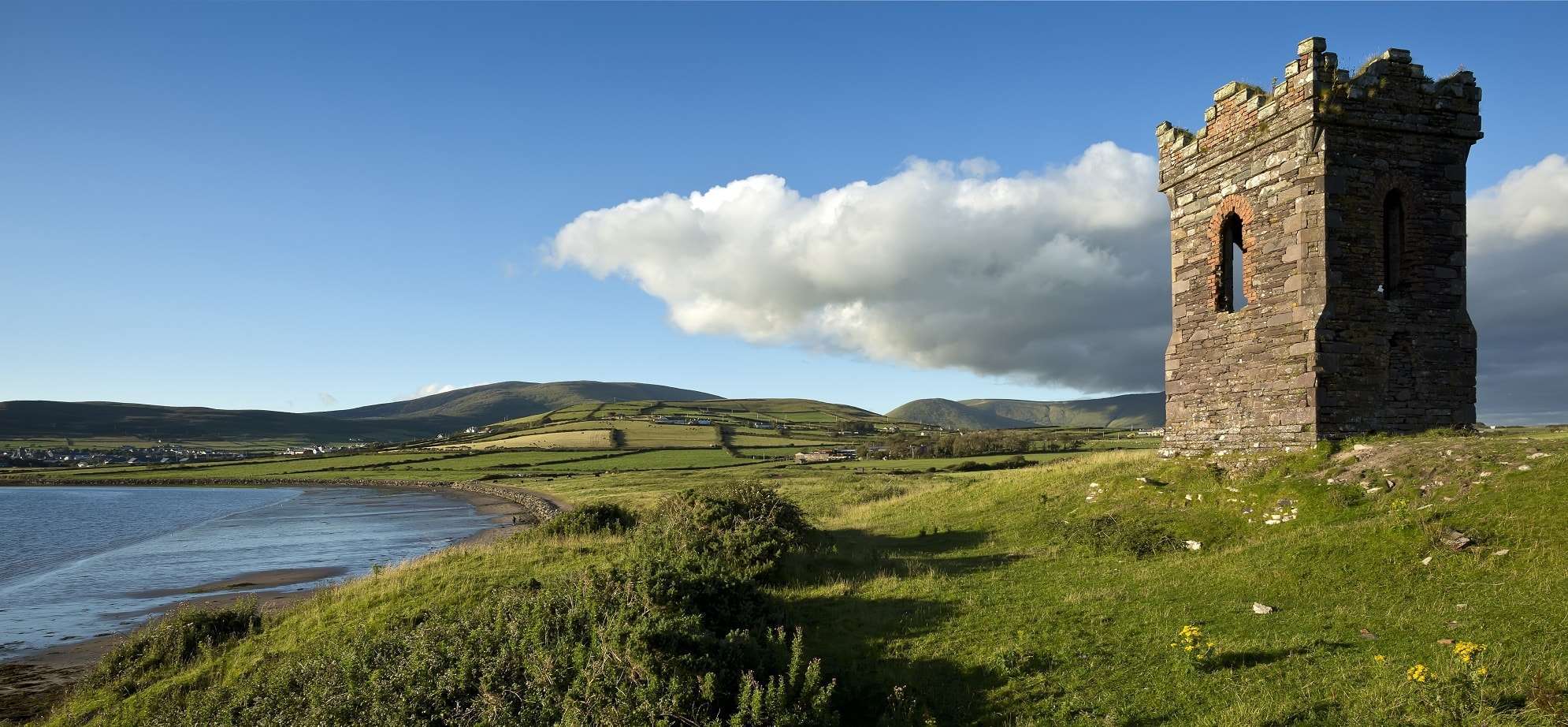 Old stone watch tower overlooking Dingle Bay, County Kerry