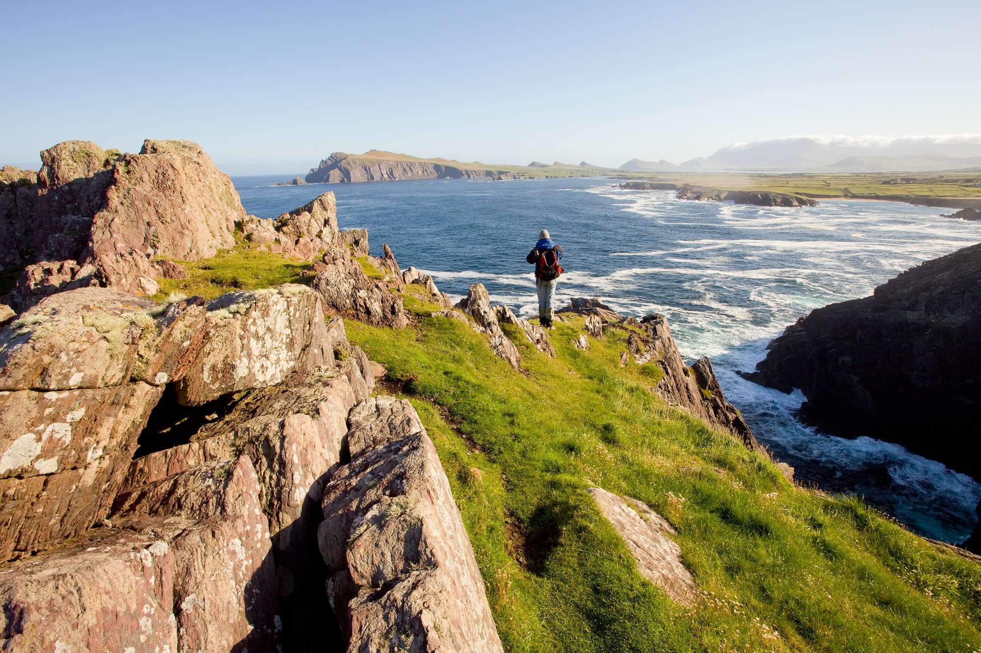 Walker stadning at the edge of the Kerry Way