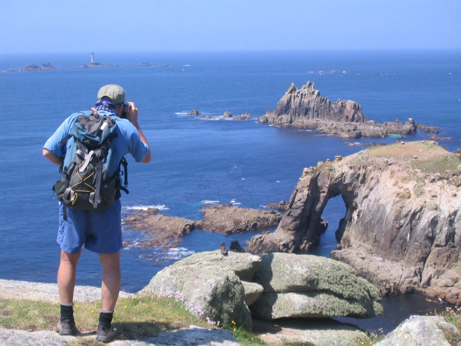 Image of man spying view out over Lands End