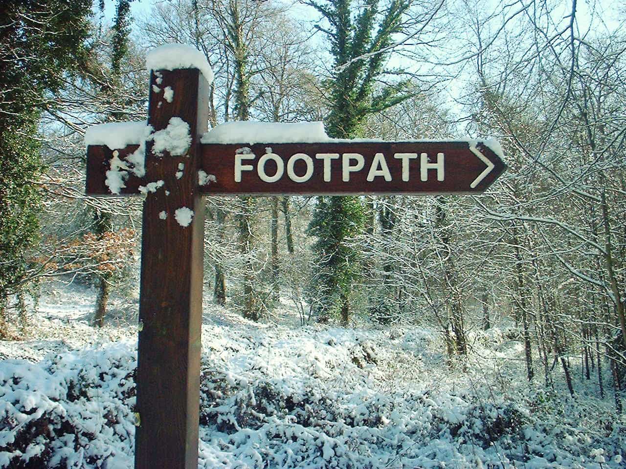 Footpath signpost in winter