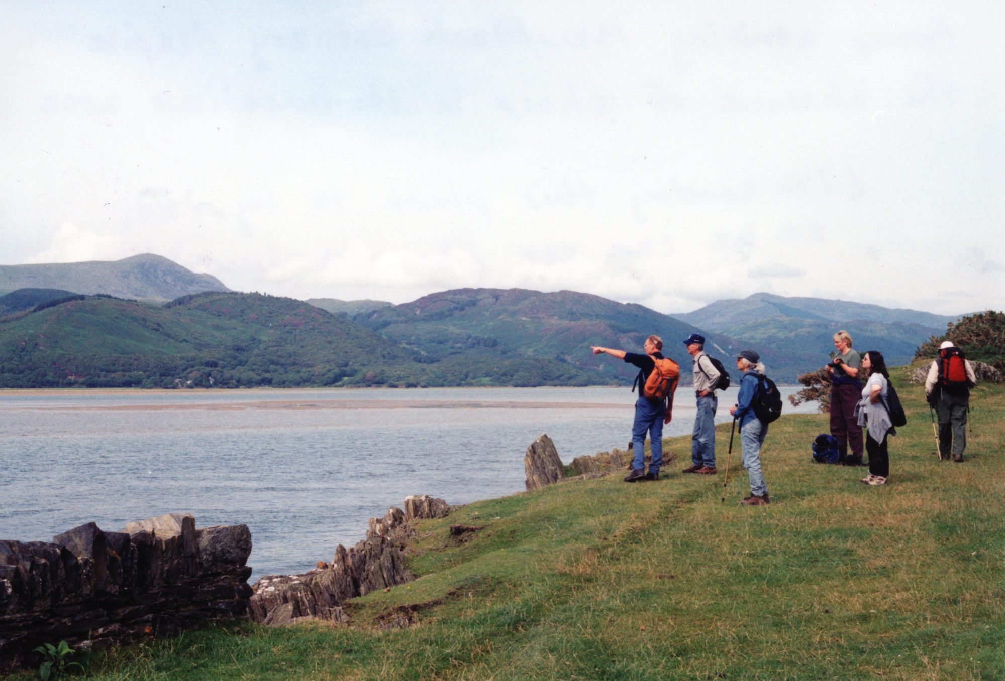 Walkers taking a moment out to discuss aspects of the scenery before them