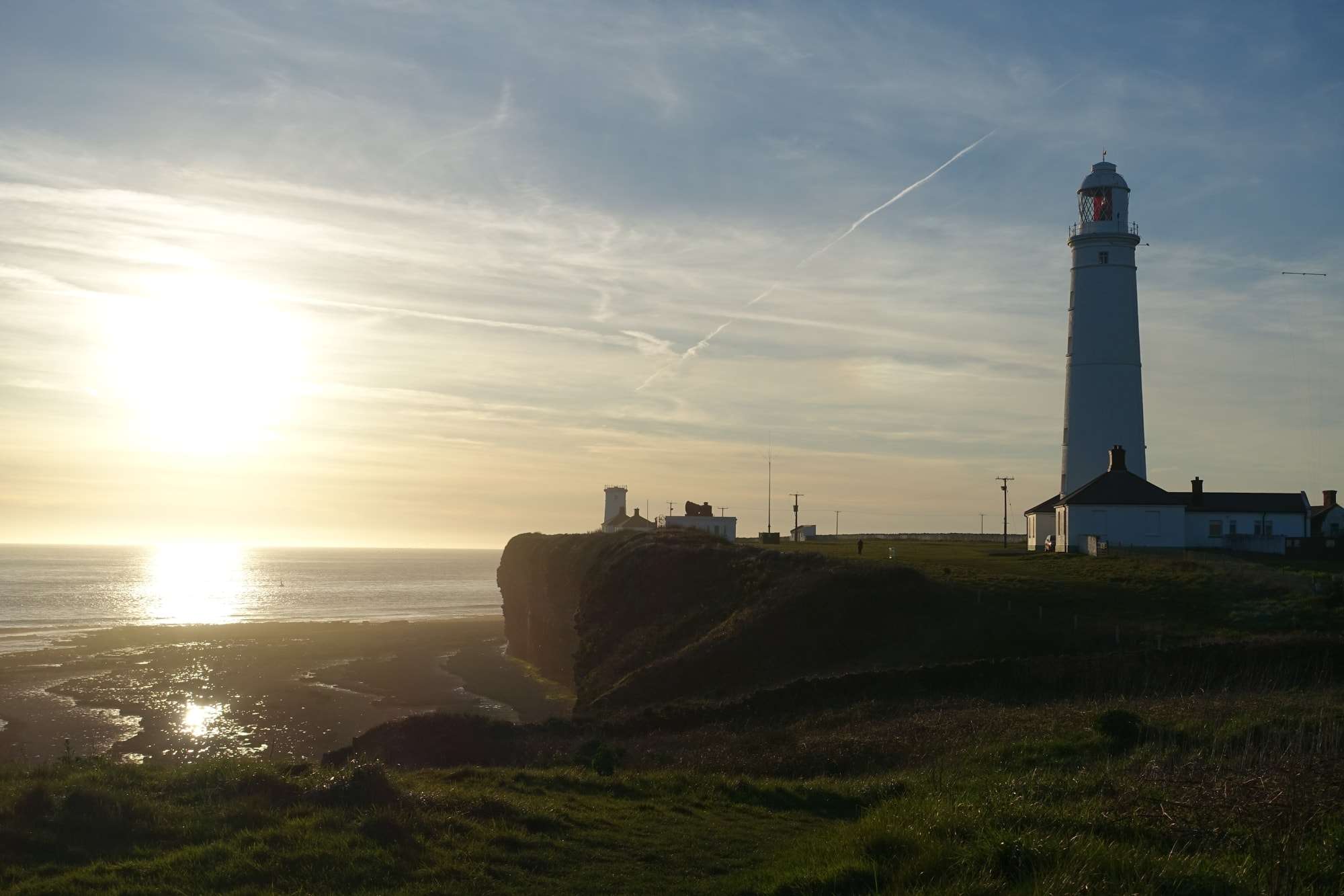 Sunset over Nash Point Lighthouse Wales Coast Path