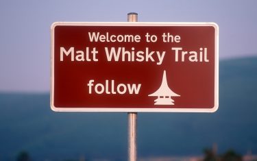 The road side welcoming visitors to the malt whiskey trail