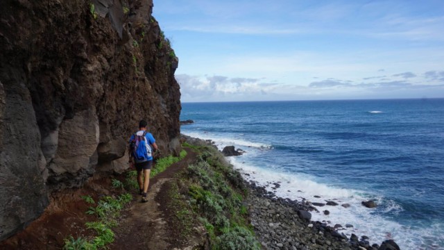 Man walking coat path in Madeira